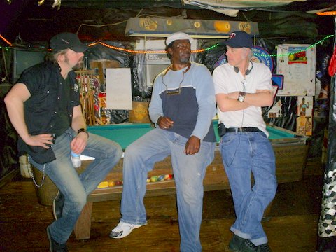 PHOTO:  (L to R) Award-winning Country musician and TV personality Jason McCoy, Terry ”Harmonica” Bean, and TV producer Joel Stewart of CMT Canada, all at Po’ Monkey’s Lounge in Merigold, Mississippi, prior to shooting part of Jason McCoy Eats America.